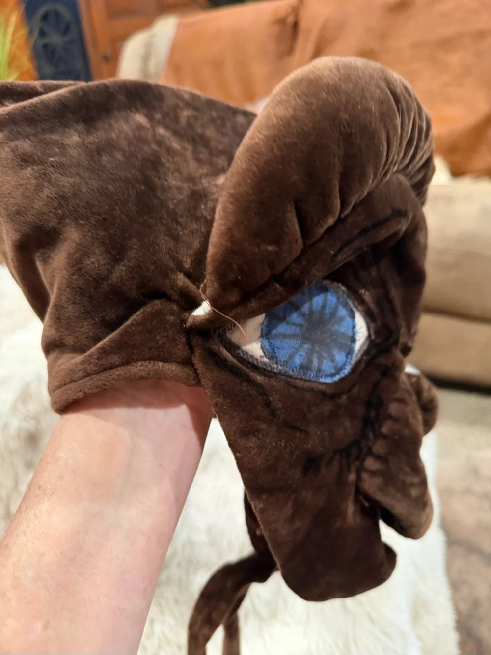 ET. Brown Plush Novelty Accent Pillow with Blue Eye